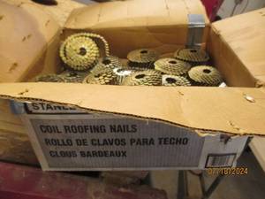 lot 52 image: Stanley Bostich coil roofing nails...