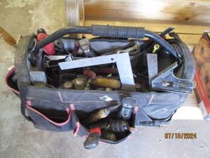 lot 90 image: Tool bag stuffed with hand tools...