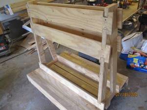 lot 92 image: Wood rack on wheels...
