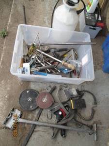 lot 98 image: Tote of measuring tapes, sanders, p...