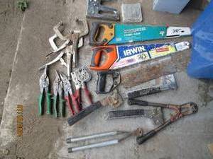 lot 99 image: Lot of hand saws staplers and other...