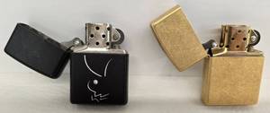 lot 157 image: Vintage ZIPPO Playboy Bunny & Gold Lighters