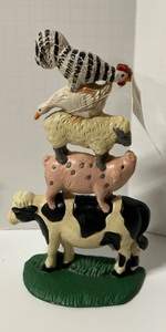 lot 276 image: COWS & More COWS Midwest Importers Cast Iron Door Stop Bookends &  Cow Stacked Wall Hook