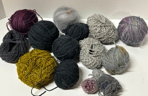 lot 326 image: Lot of Handspun Mohair and Wool Yarn Balls, Crochet Hooks and Mohair Emmas Yarn Skein