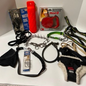 lot 329 image: DOG TRAINING Items Including Various Dog Collars, New Retractable Leash, Muzzle, Training Book, New Retrieving Bouy & More