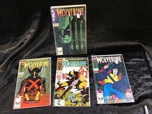 lot 61 image: 4 Vintage Wolverine Comic Books in Plastic Sleeve