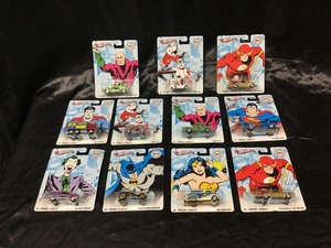 lot 77 image: Complete Unopened DC Set of Hot Wheels with Extras