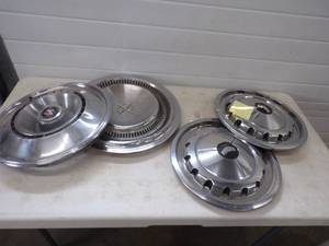 lot 84 image: 2 57 Chevy Hub caps 14 and 2 Vintage 15 Hub Caps