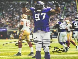 lot 18 image: Framed Eversen Griffen #97 Minnesota Vikings Autographed Photo (14x16)