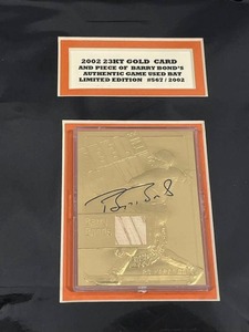 lot 30 image: 2002 23KT Gold Card and Piece of Barry Bonds Authentic Game Used Bat Limited Edition (5672002) in 14x18 Frame