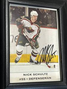 lot 37 image: Framed Minnesota Wild Autographed Photos - Kurtis FosterNick SchultzWes WalzBrad Bombardir