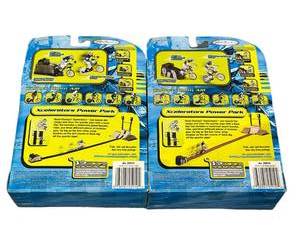 lot 83 image: Vintage Jakks Pacific Road Champs Xclerators Motorized Bikes - Sealed with some package wear