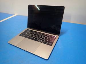 lot 42 image: Apple&nbspMacBookPro15,2 A1989 &nbspINTEL CORE I7-8559U 2.6 Ghz  16GB LPDDR3 RAM  500GB SSD  13.3 screen with 2560 x 1600 Resolution  No Charger  Includes IOS &nbspLight key marks on screen,&nbspScratched keys