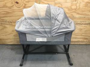 lot 59 image: Bedside Crib with Adjustable Height, Portable Bed for InfantNewborn (It is missing Parts) Model # 968