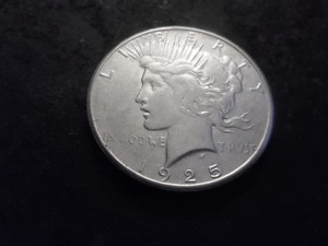 lot 47 image: 1925 S Peace Silver Dollar