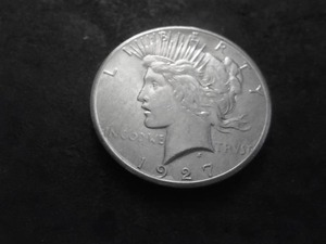 lot 51 image: 1927 Peace Silver Dollar