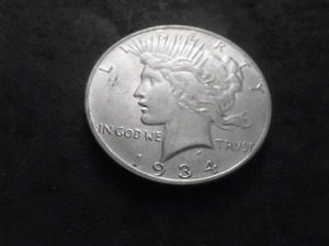 lot 54 image: 1934 Peace Silver Dollar