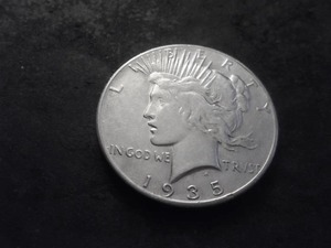 lot 57 image: 1935 Peace Silver Dollar