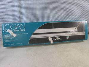 lot 12 image: (EW5) Logan Compact Mat Cutter - Model 301