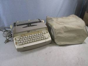 lot 15 image: (CS) Vintage Smith-Corona Electric Typewriter with Cover - As-Is