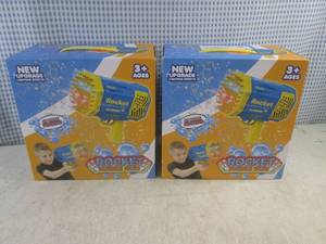 lot 81 image: (F-0) 2 Rocket Bubble Guns - USB Rechargeable with Lighting Effects - Both Purple