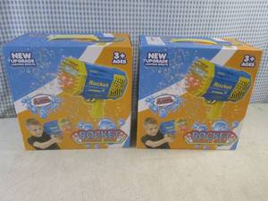 lot 133 image: (F-0) 2 Rocket Bubble Guns - USB Rechargeable with Lighting Effects - Both Purple