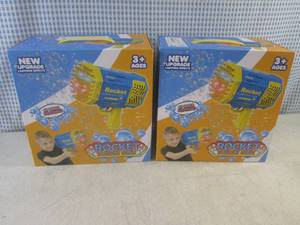 lot 135 image: (F-0) 2 Rocket Bubble Guns - USB Rechargeable with Lighting Effects - Both Purple