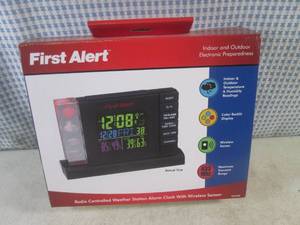 lot 220 image: (CS) First Alert IndoorOutdoor Radio Controlled Weather Station Alarm Clock with Wireless Sensor - New