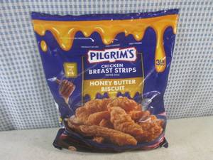 lot 228 image: (FRZ) 3 Pound Bag Frozen Chicken Breast Strips Fritter Style Honey Butter Biscuit Flavor Past Date