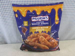 lot 231 image: (FRZ) 3 Pound Bag Frozen Chicken Breast Strips Fritter Style Honey Butter Biscuit Flavor Past Date