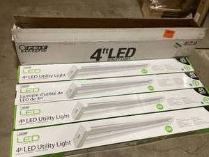 lot 2 image: Lot of 4 Feit Electric 4 ft. 2-Light 45-Watt Integrated LED Utility White Shop Light, 4000K Cool White (4-Pack)  Customer Returns See Pictures