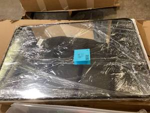 lot 32 image: XRAMFY 24 in. W x 36 in. H Rectangular Aluminum Alloy Framed Rounded Black Wall Mirror   Customer Returns See Pictures