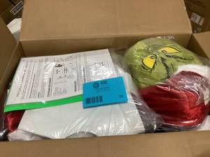 lot 52 image: Grinch 4 ft. Animated Grinch     Customer Returns See Pictures