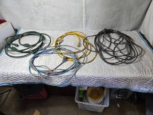 lot 392 image: Lot of Extension Cords, Some are taped and May or May Not Need Additional Repair