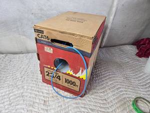 lot 255 image: Partial of a 1000 Roll of Cat6 Cable