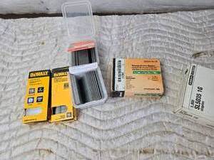 lot 217 image: Partial Boxes of Finish Nails, Staples, Brad Nails