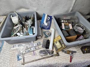 lot 153 image: 2 Plastic Bins full of Plumbing, Fasteners, Drawer Pulls and Other - Bins have cracks in bottom