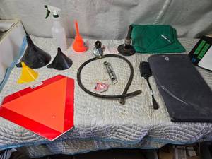 lot 143 image: Funnels, Propane Hose, Slow Moving Sign, Snow Plow Shoe