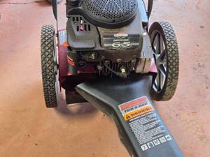 lot 4 image: Swisher Walk Behind Weed Trimmer
