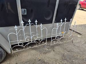 lot 496 image: Wrought Iron Fence Decor - 2 Pieces, One is bent a bit