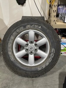 lot 16 image: Nissan Rim and Tire