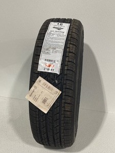 lot 32 image: New All-Season Tire 18565R15