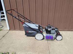 Murray push mower with bag. Like new condition. As shown.