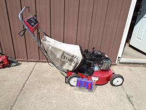 Toro GT5 self propelled with bag. Good used condition. Tested & works. As shown.