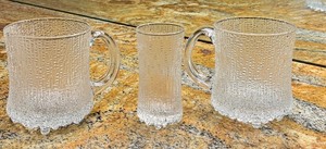 lot 104 image: Two iittala Ultima Thule Mugs and Cordial Glass