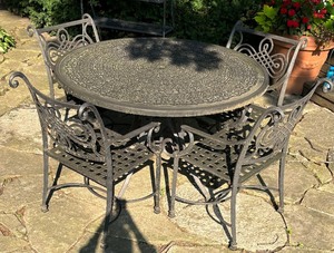 lot 215 image: Metal Patio Table with Four Chairs
