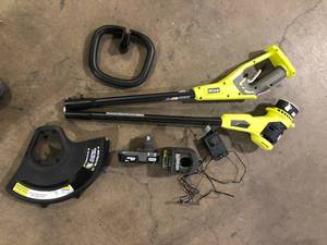 lot 2 image: RYOBI ONE 18V 13 in. Cordless Battery String Trimmer with 2.0 Ah Battery and Charger  Customer Returns See Pictures