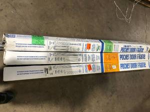 lot 27 image: Lot of Johnson Hardware 1500 Series 24 in. to 36 in. x 80 in. Universal Pocket Door Frame for 2x4 Stud Wall  Customer Returns See Pictures