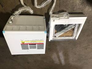 lot 9 image: GE 5,000 BTU 115V Window Air Conditioner Cools 150 Sq. Ft. in White Damaged Customer Returns See Pictures
