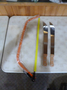 lot 74 image: Saw and Machetes